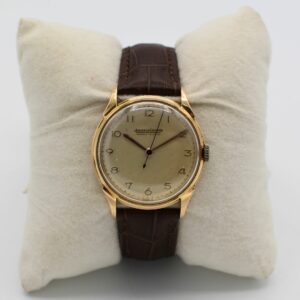 Montre mecanique Jaeger LeCoultre en or jaune 18K