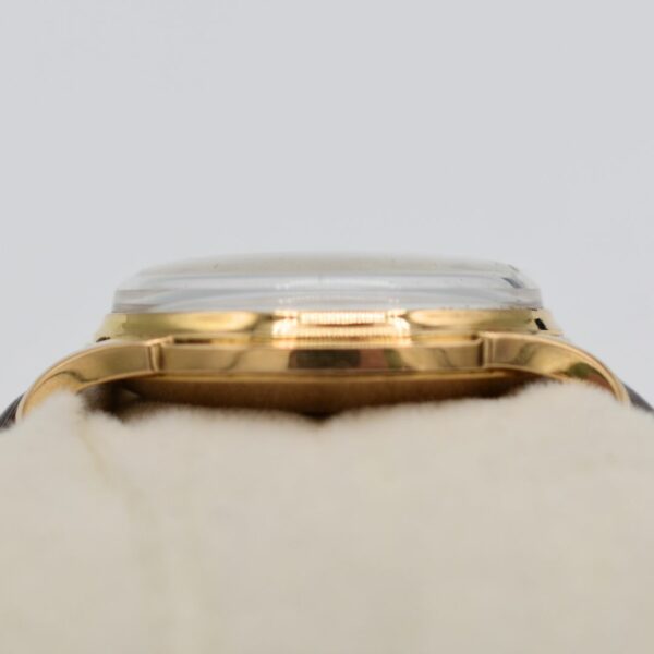 Montre mecanique Jaeger LeCoultre en or jaune 18K