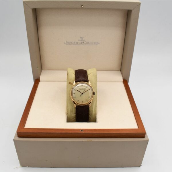 Montre mecanique Jaeger LeCoultre en or jaune 18K